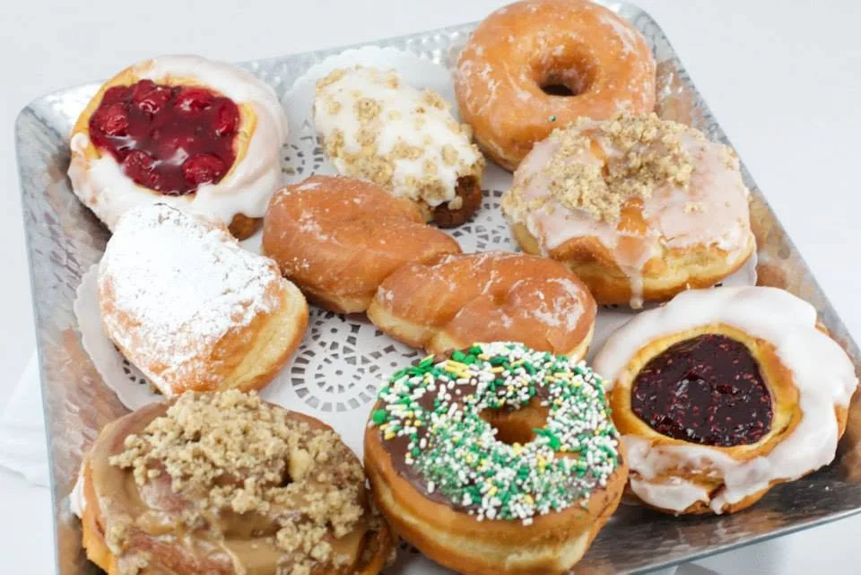 Tray of fresh assorted donuts